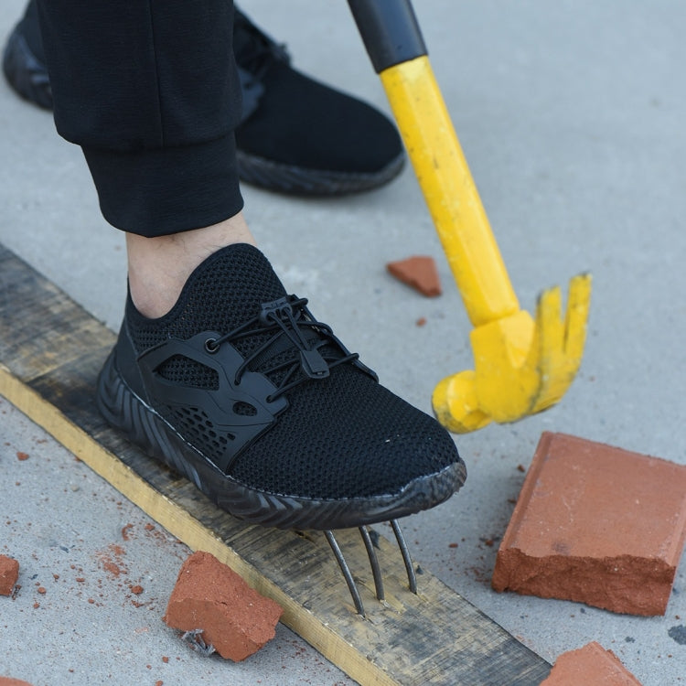 Black lace-up work safety shoes standing on a step with puncture-resistant spike points