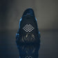 Front view of black work safety shoe with perforated toe guard and lace closure