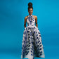 Feather-print halter-style maxi dress on model, fitted waist with full skirt