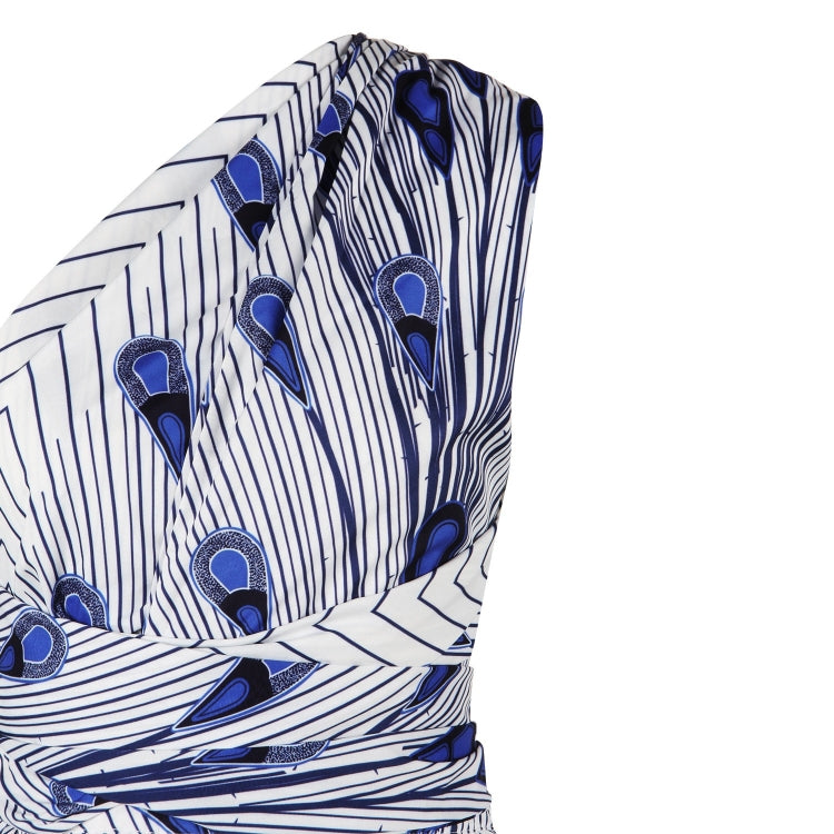 Feather-print fabric close-up with ruched waist seam and gathered skirt