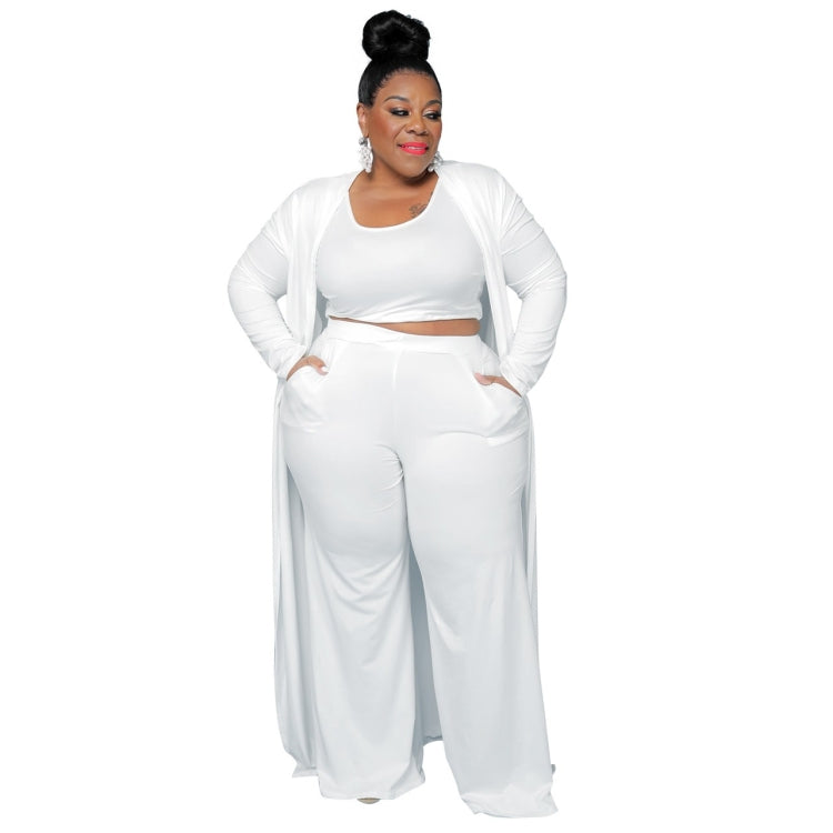 White three-piece outfit: cropped top with long sleeves, wide-leg pants, open cardigan