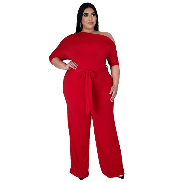 Red off-shoulder jumpsuit with drawstring waist and wide-leg pants, angled front